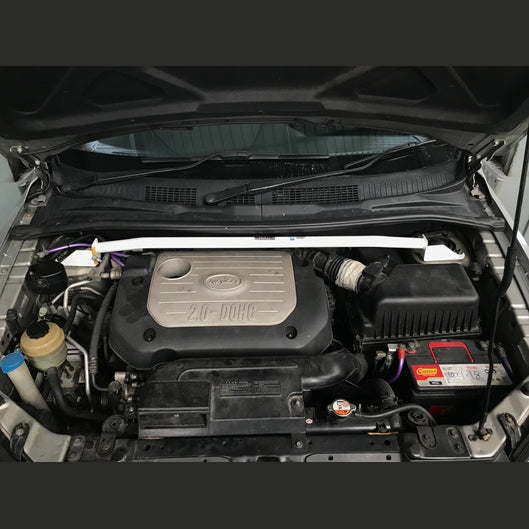 Barre anti-rapprochement Ultra Racing à 2 points KIA CARENS 1ST GEN (RS) 1.8 2WD 1999-2006